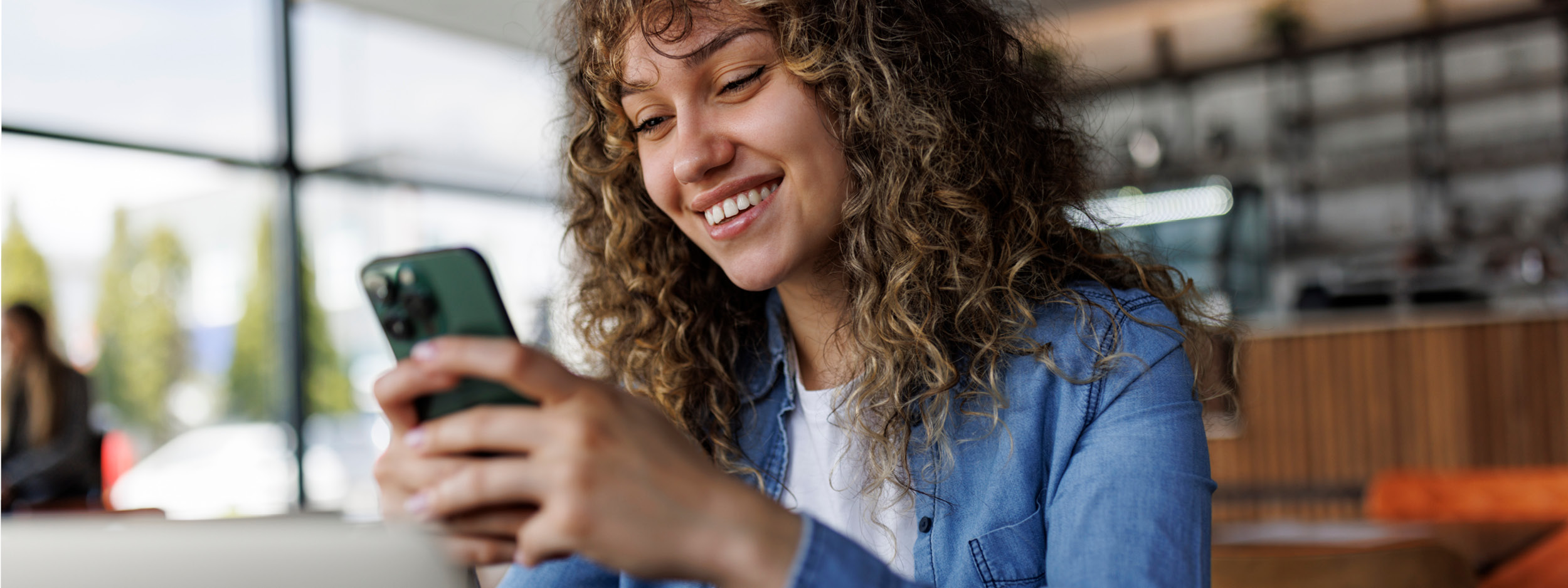 girl looking at her phone